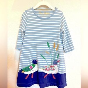 Mini Boden Girls Appliqué striped dress with 3/4 sleeves.